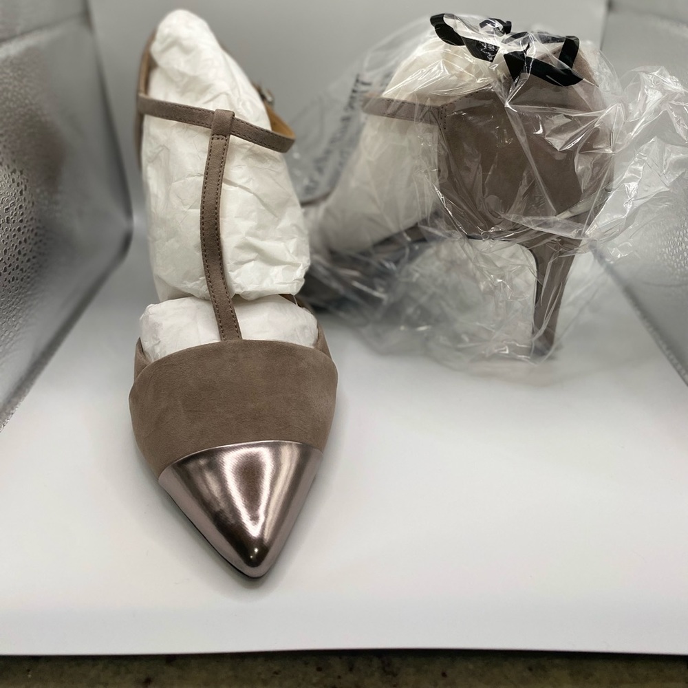 Never worn Calvin Klein taupe suede pumps; never used.